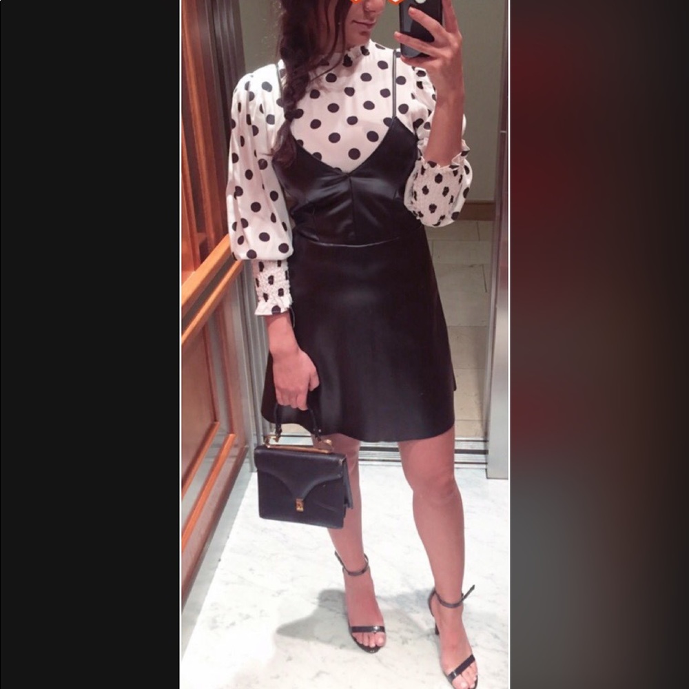 Faux leather mini dress.
